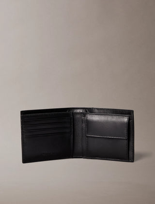 CALVIN KLEIN PORTAFOGLIO A LIBRO CON MOTIVO IN RILIEVO LV04D1163G UB1