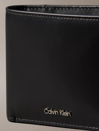 CALVIN KLEIN PORTAFOGLIO A LIBRO CON MOTIVO IN RILIEVO LV04D1163G UB1