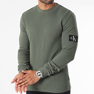 CALVIN KLEIN JEANS MAGLIONE  GIROCOLLO CON LOGO SU MANICA UOMO J323989 CH2